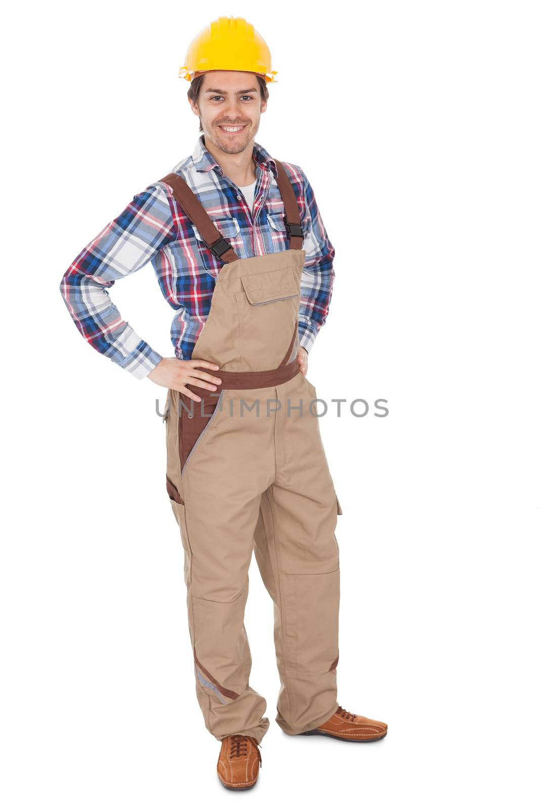 Confident worker wearing hard hat. Isolated on white