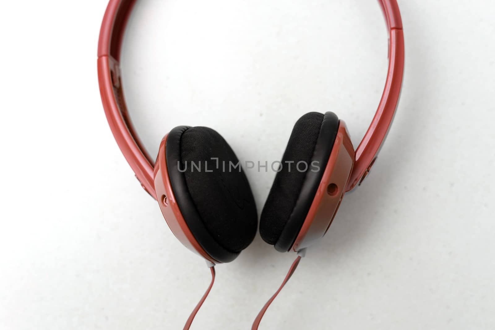 Head phones isolated on a plain bench