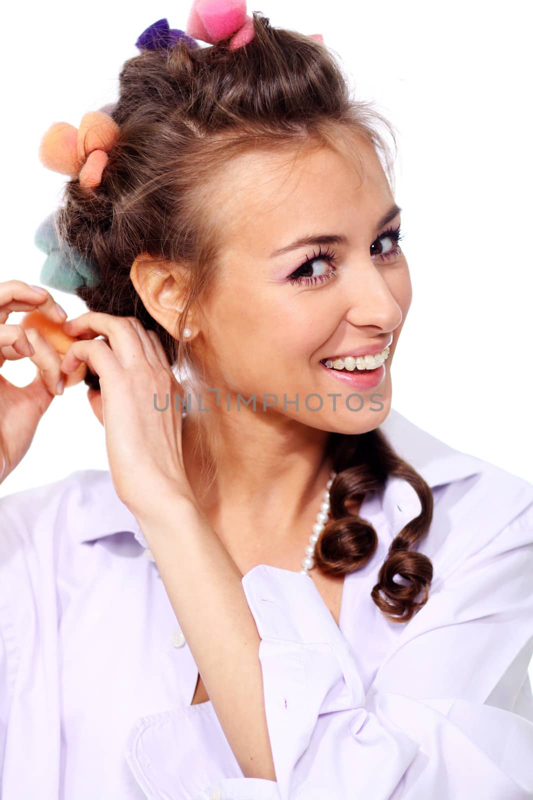 Beautiful young woman in gray background