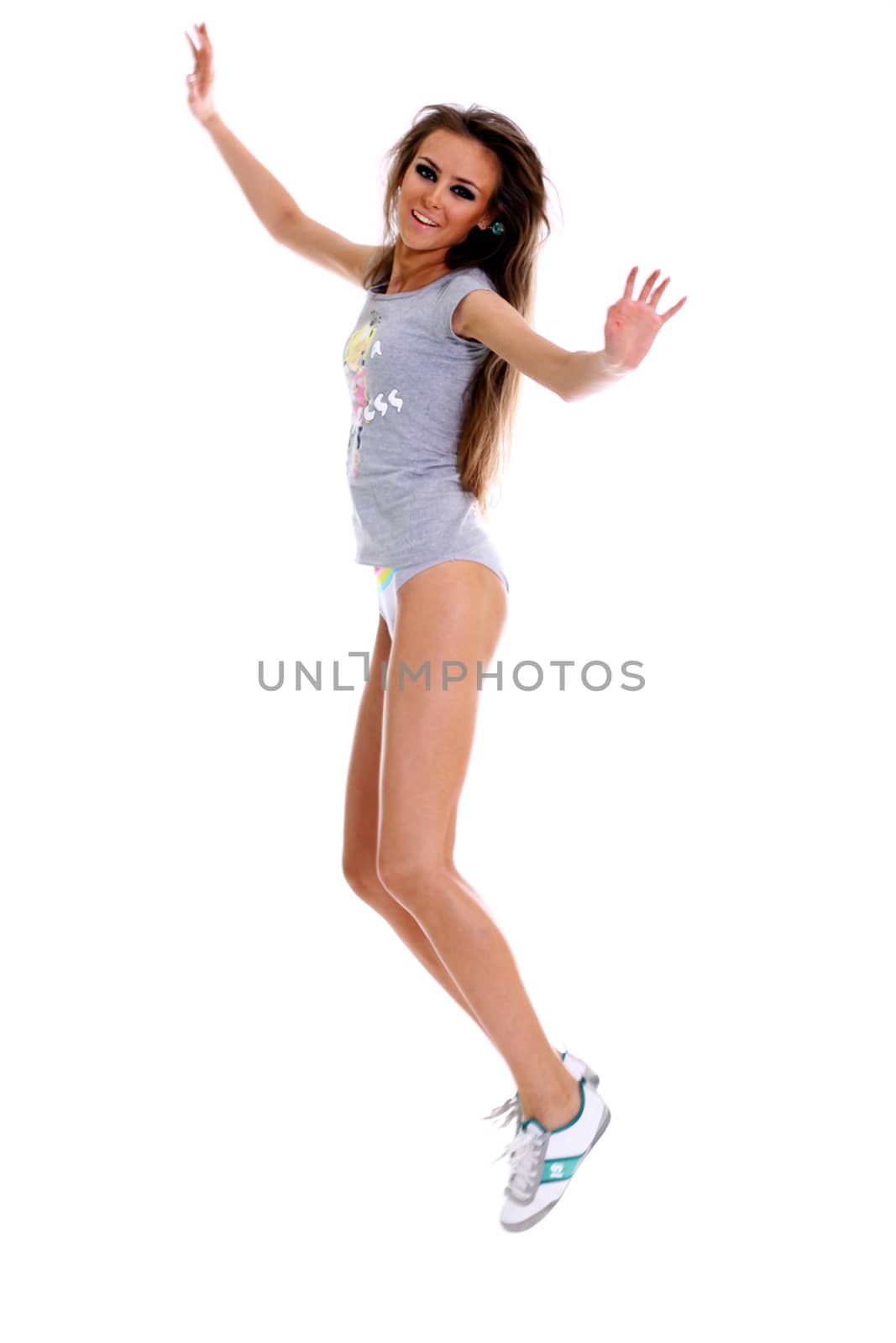 Fitness young woman in white isolated