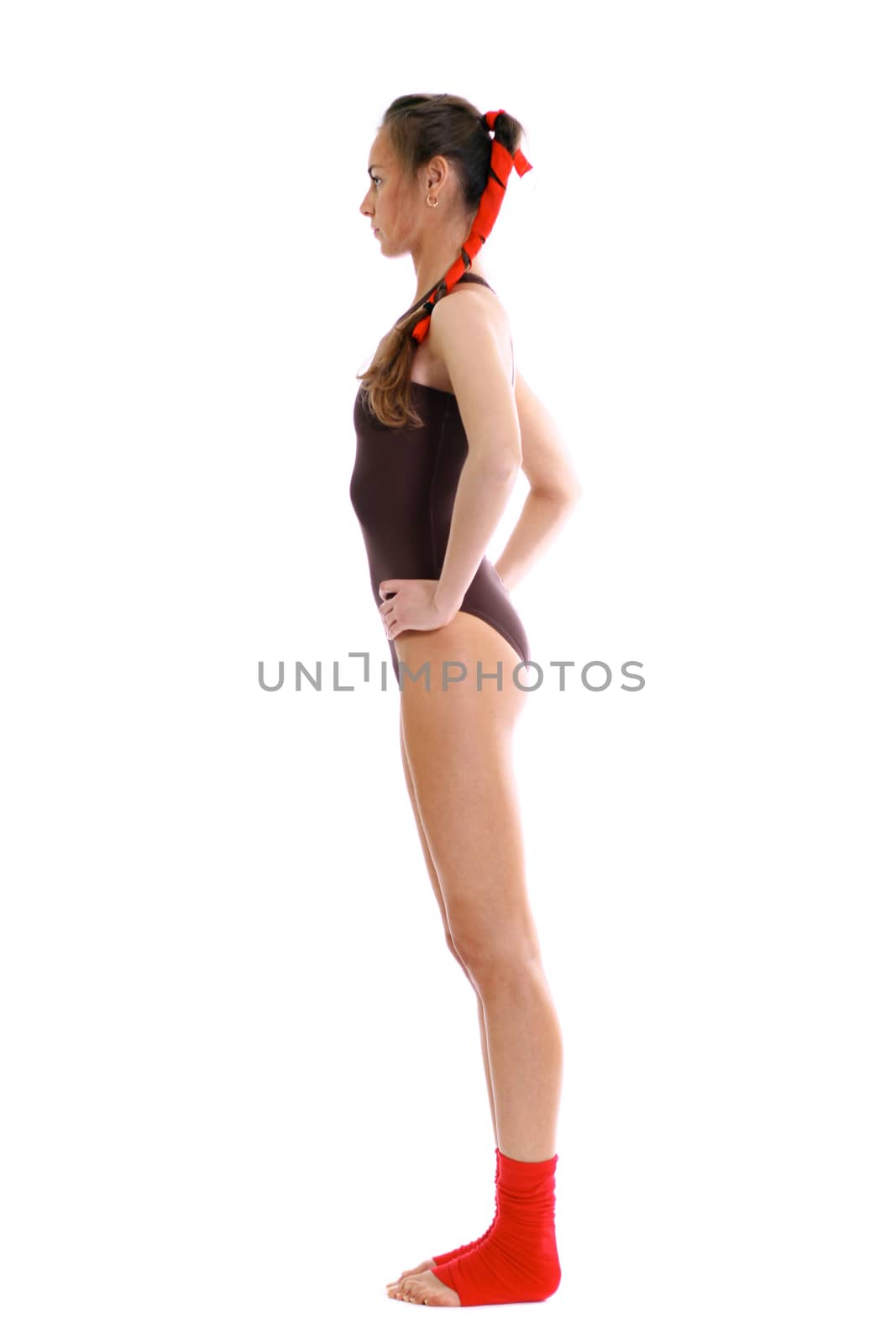 Fitness young woman in white isolated