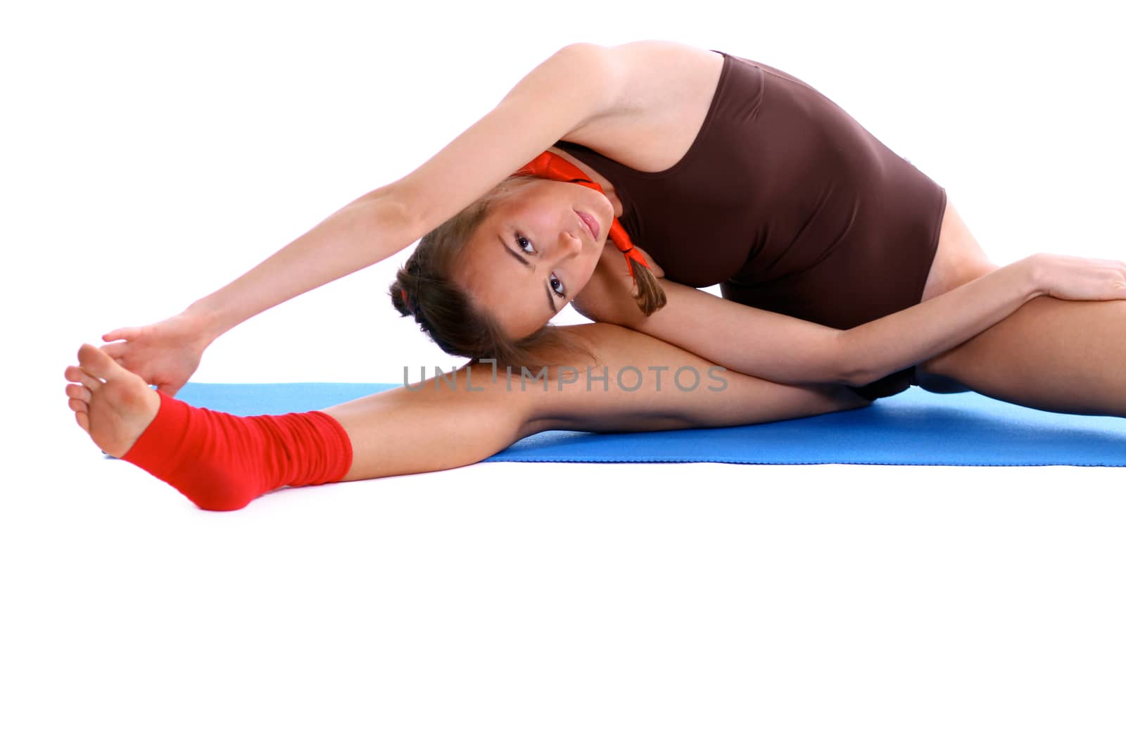 Fitness young woman in white isolated