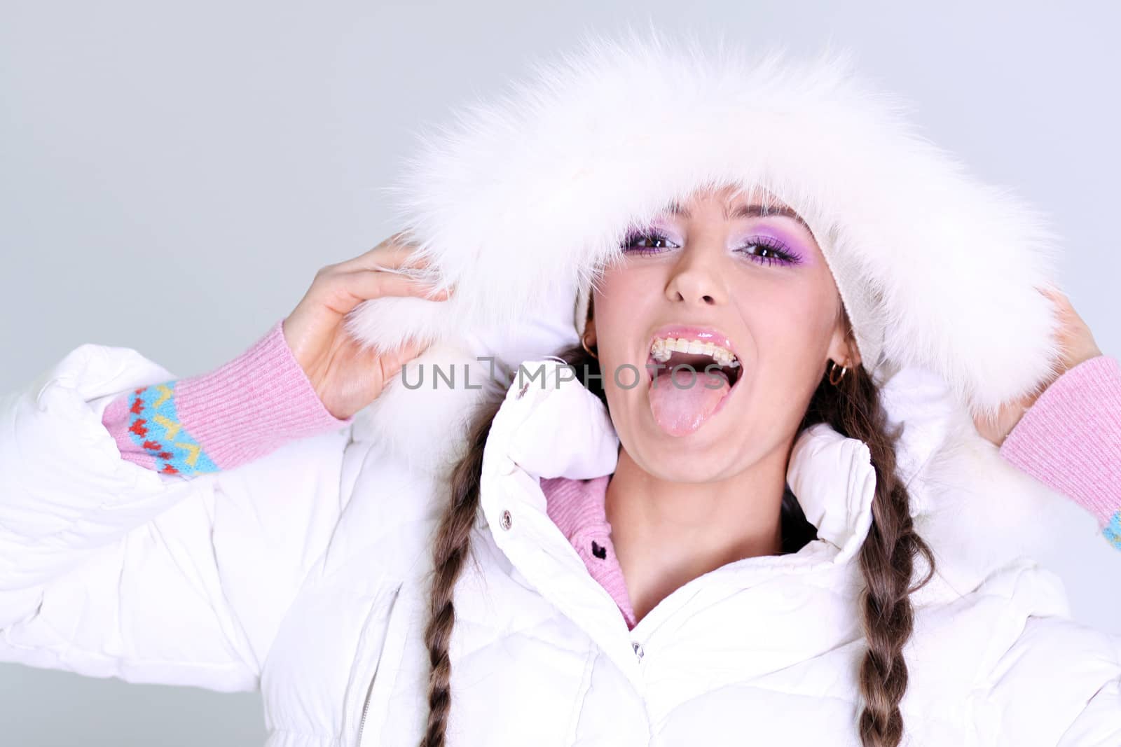 portrait of a beautiful happy woman in a knitted jacket