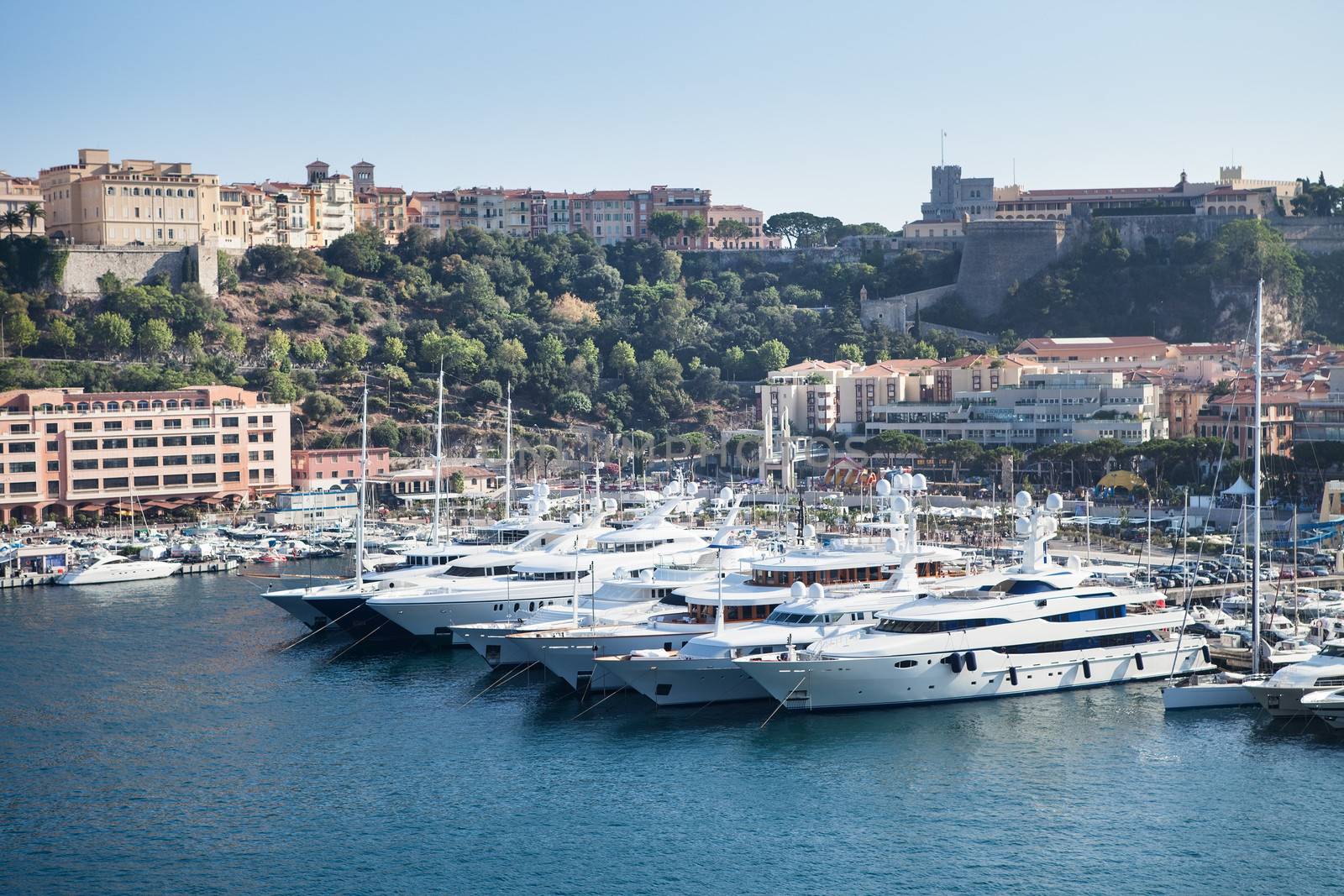 Row of yachts in Monaco Port by AndreyPopov