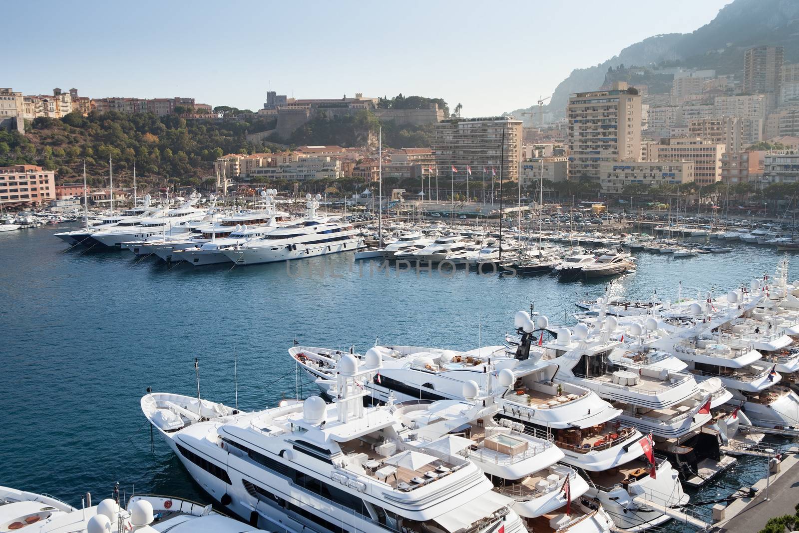 Row of yachts in Monaco Port by AndreyPopov
