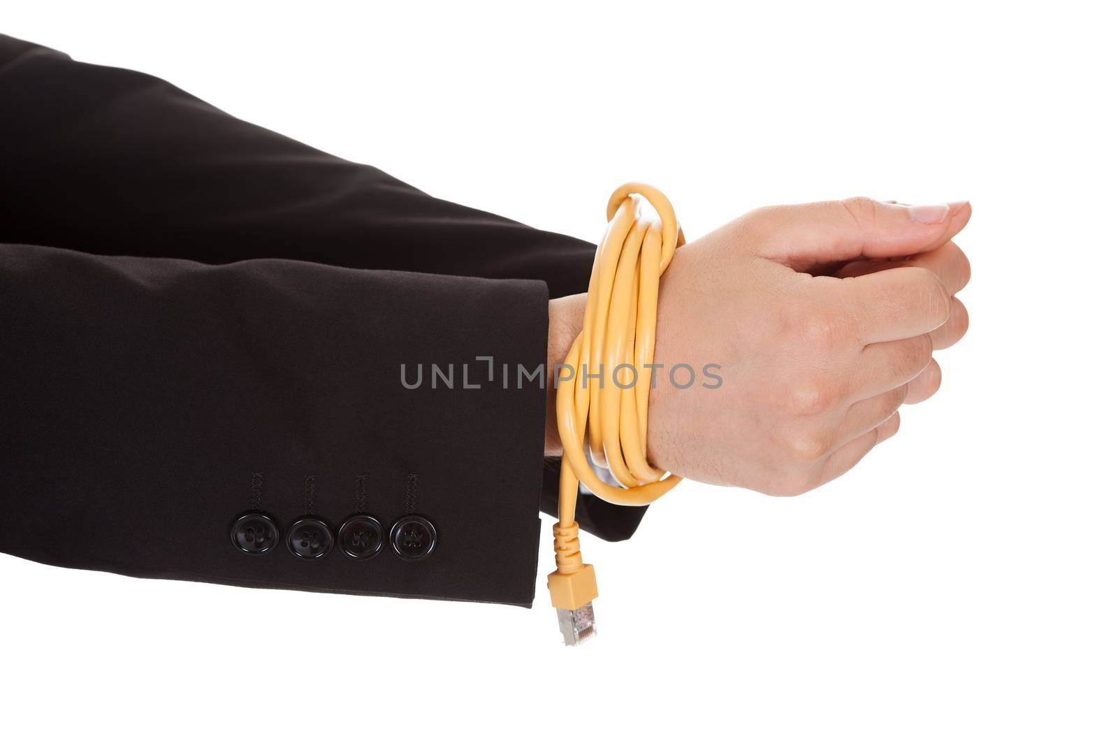 Businessman with hands tied in network cable. Isolated on white