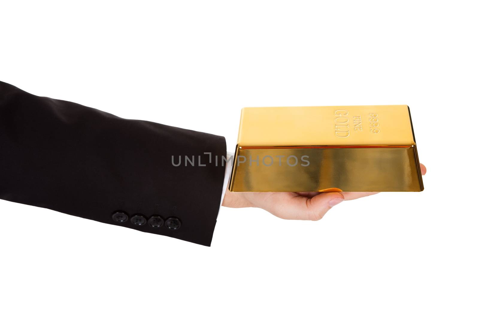 Businessman holding out a gold bar by AndreyPopov