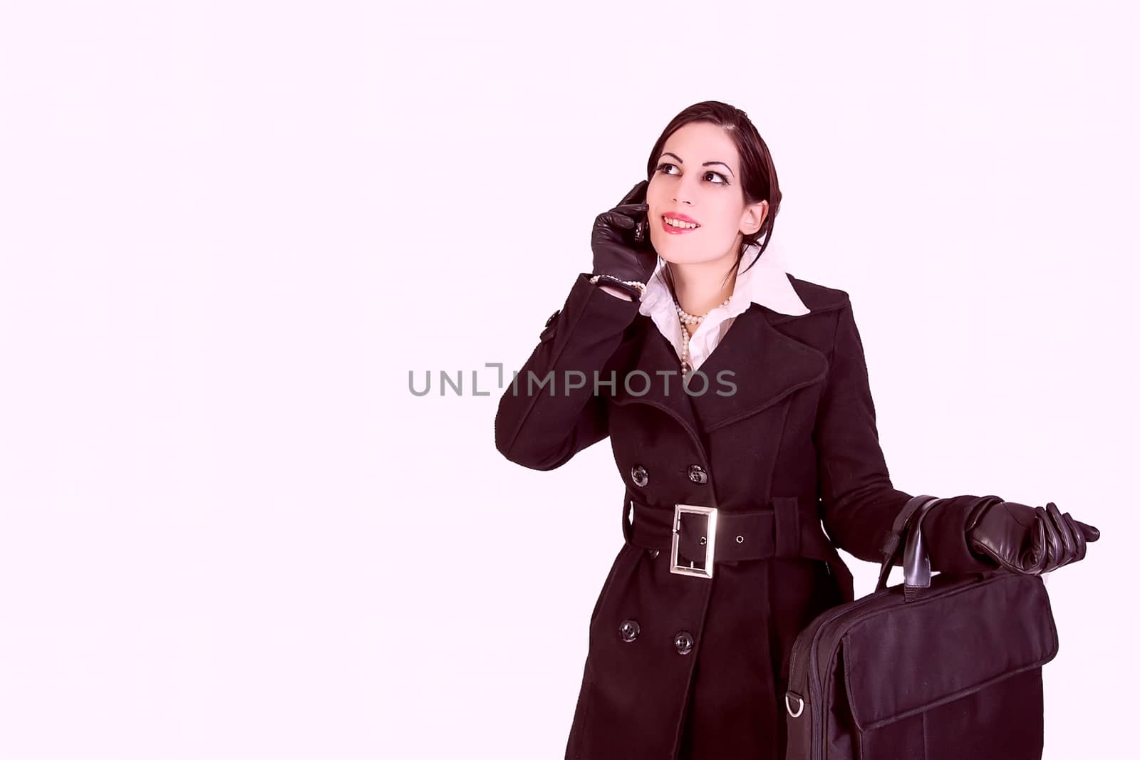 Attractive businesswoman talking on cell phone by dukibu