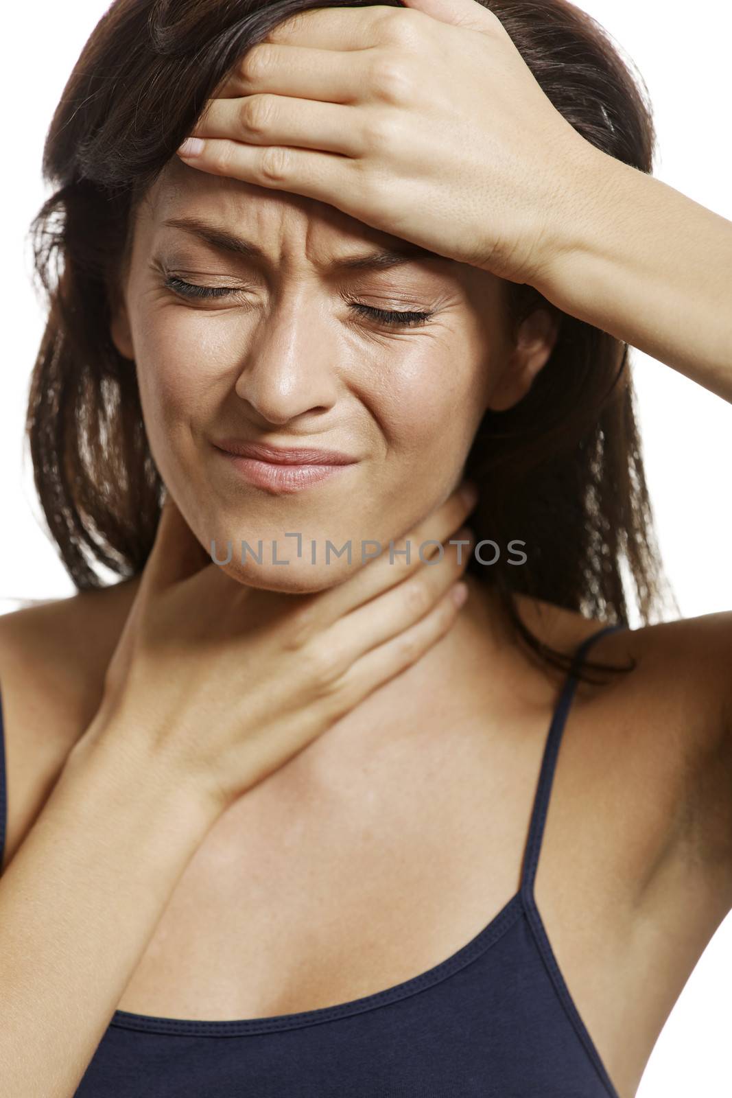 Woman with headache by studiofi