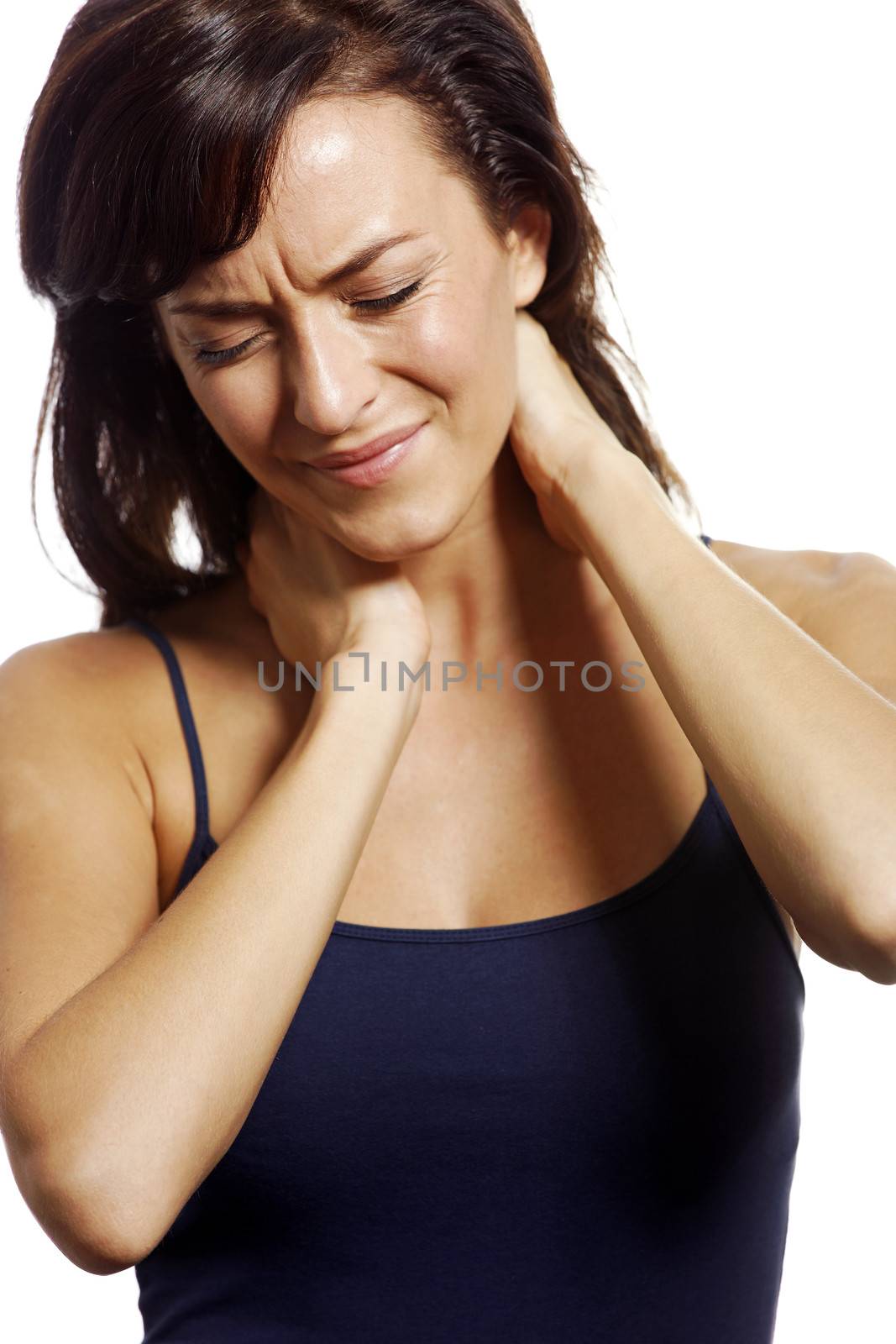 Young woman holding her aching neck