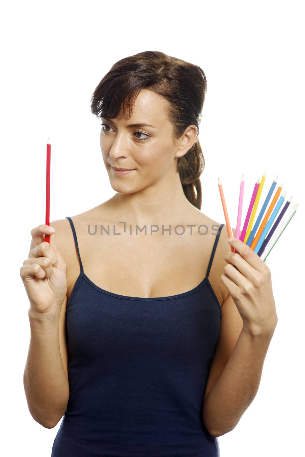 Woman holding colouring pencils by studiofi