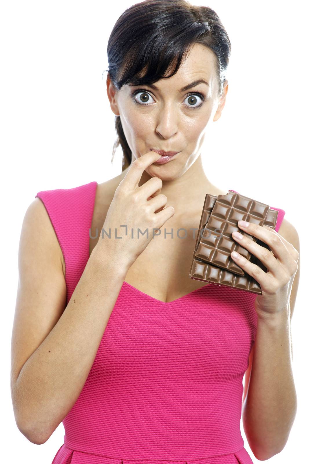 Young woman eating a huge chocolate bar