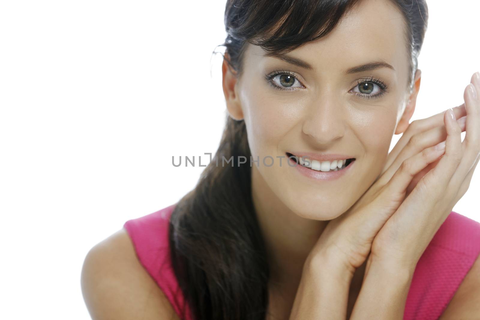 Young beautiful woman resting on her elbows smiling