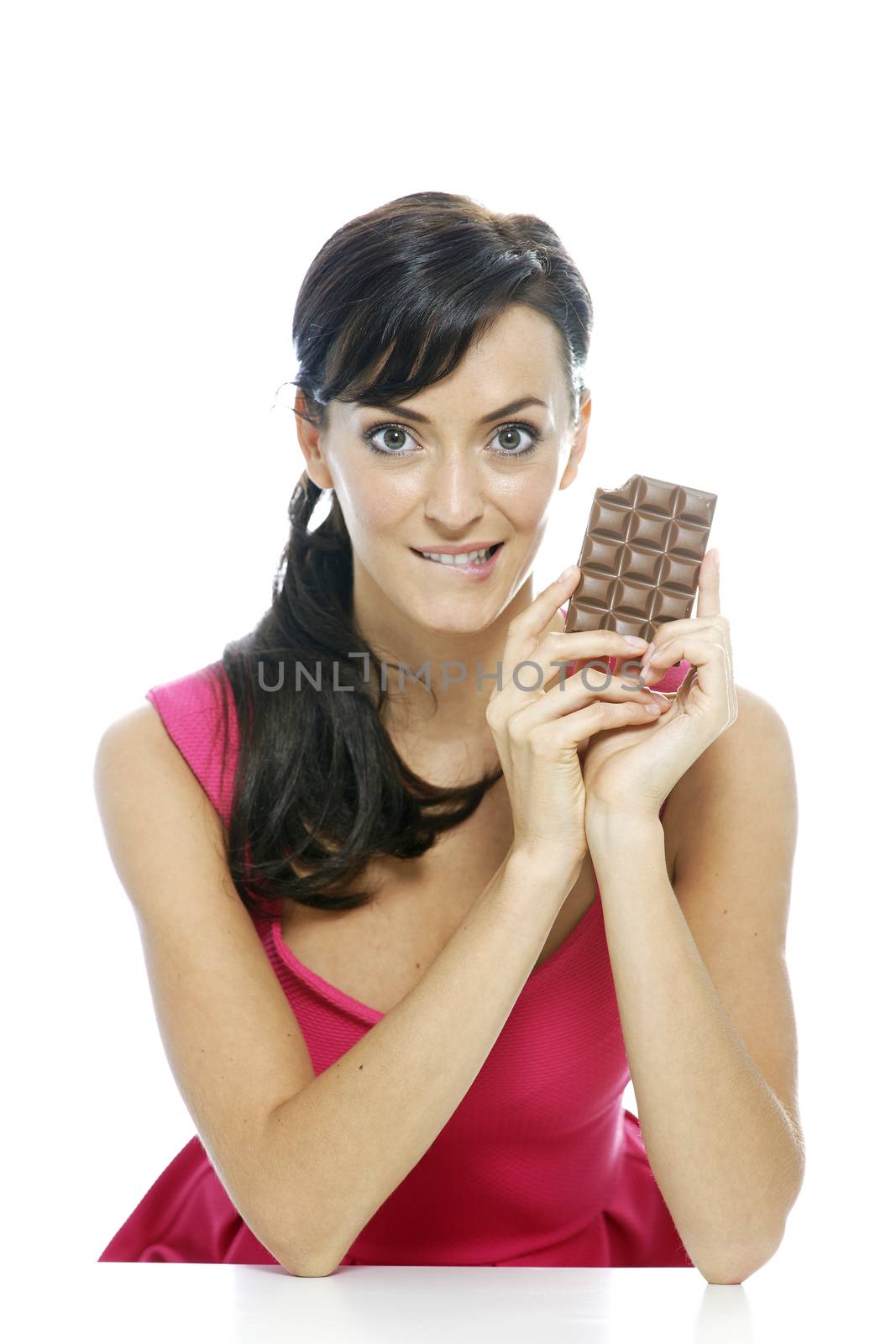 Woman eating a huge chocolate bar