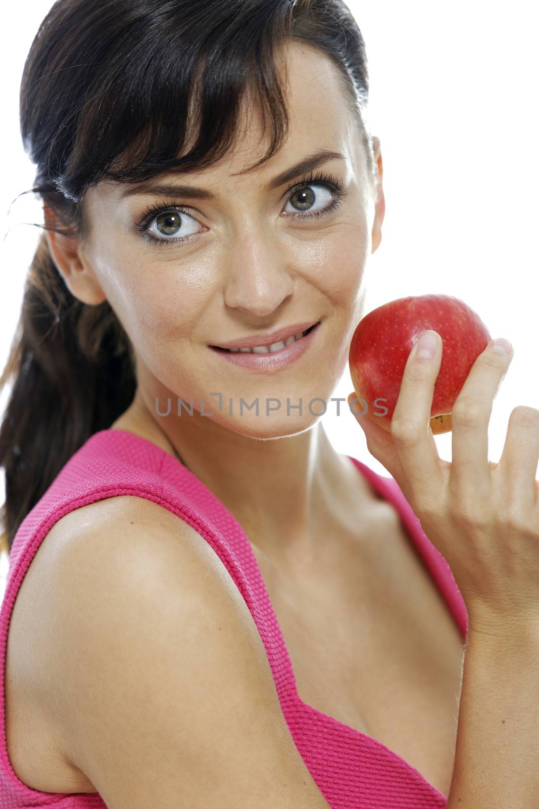 Woman holding an apple by studiofi