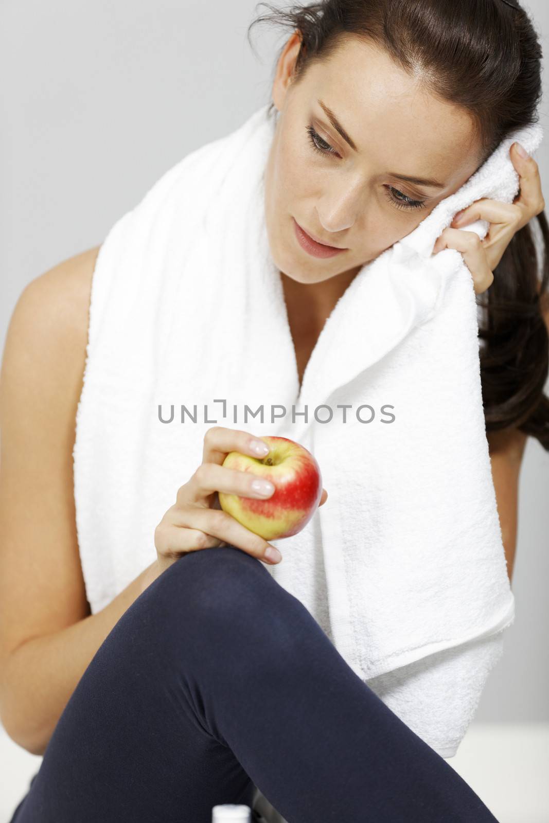 Young woman resting after a long workout.