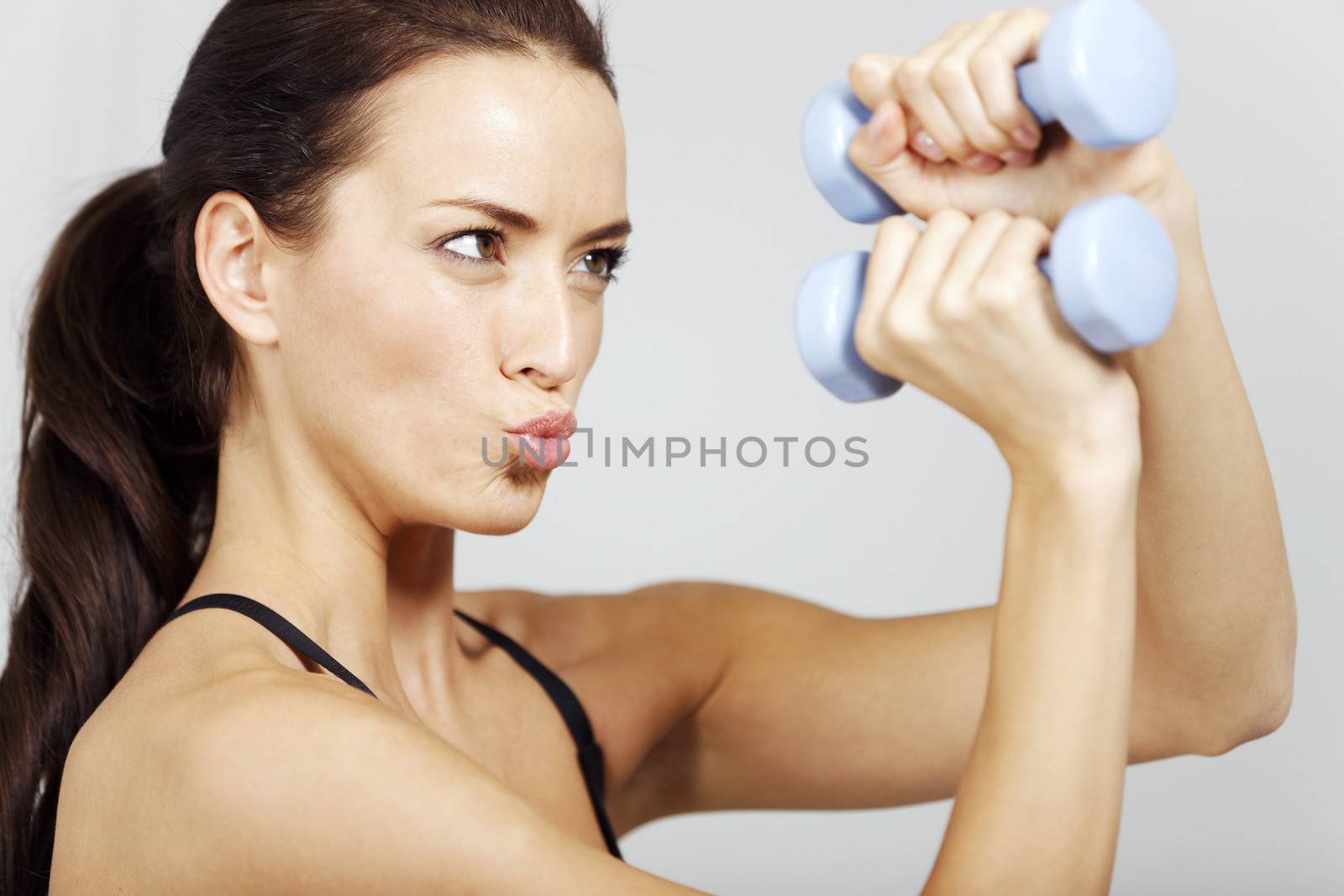 Woman in fitness by studiofi