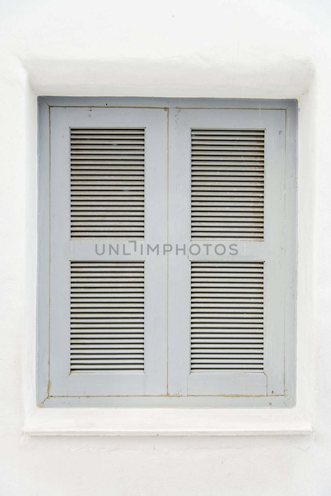 Gray wooden window on white wall2