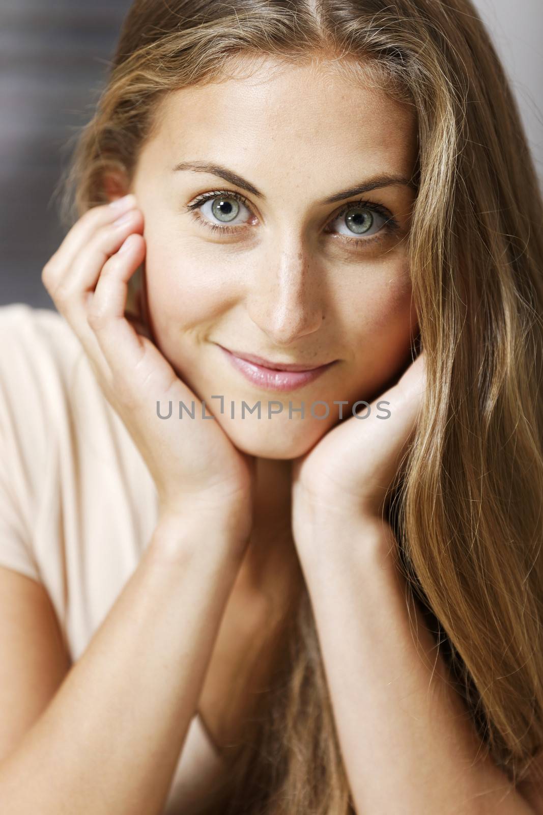 Beautiful young woman relaxing at home