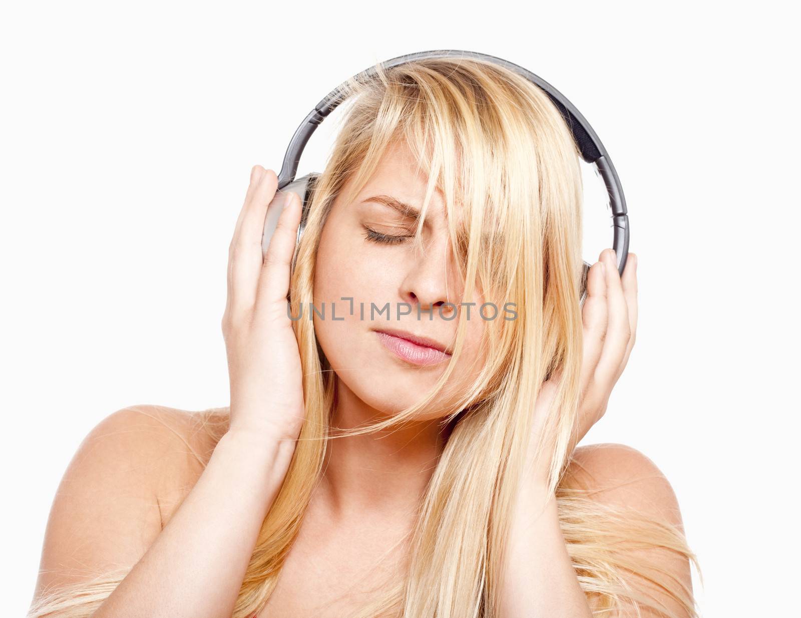 young girl listening to music by courtyardpix