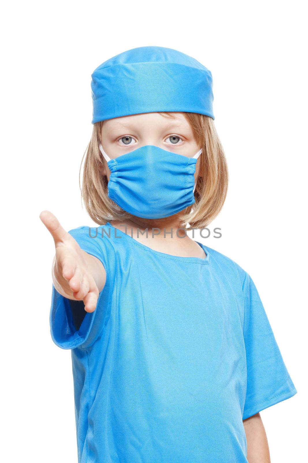 boy with long blond hair playing a doctor stretching out his hand