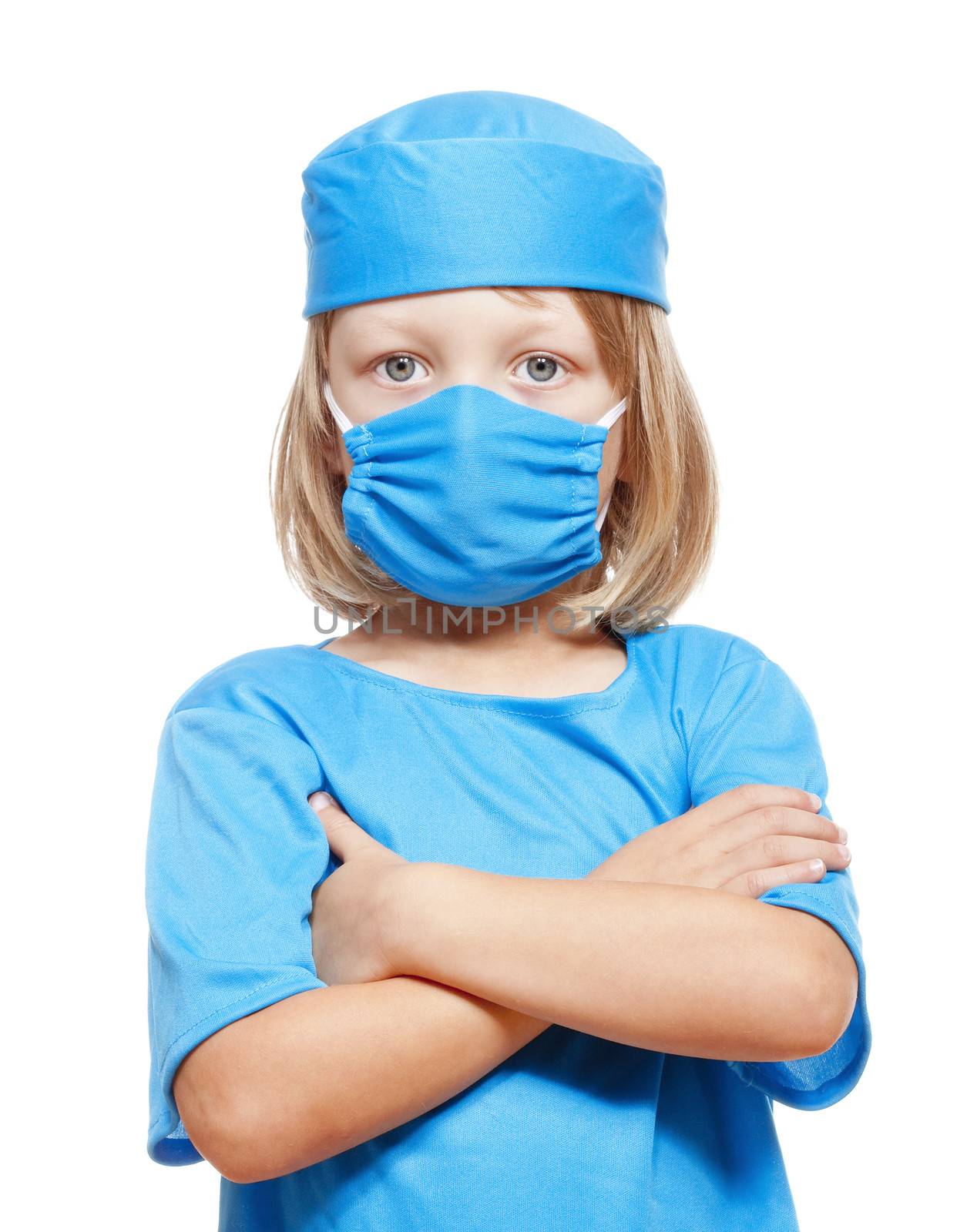 portrait of a boy with long blond hair playing a doctor