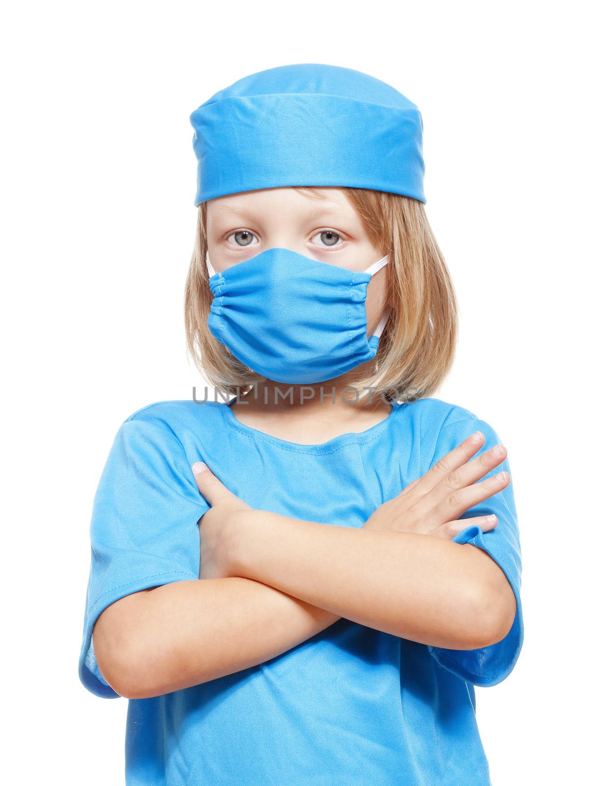 portrait of a boy with long blond hair playing a doctor