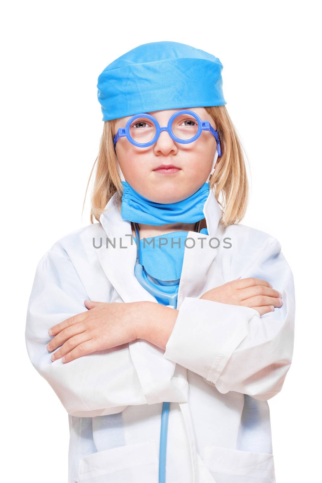 boy with long blond hair playing a doctor looking