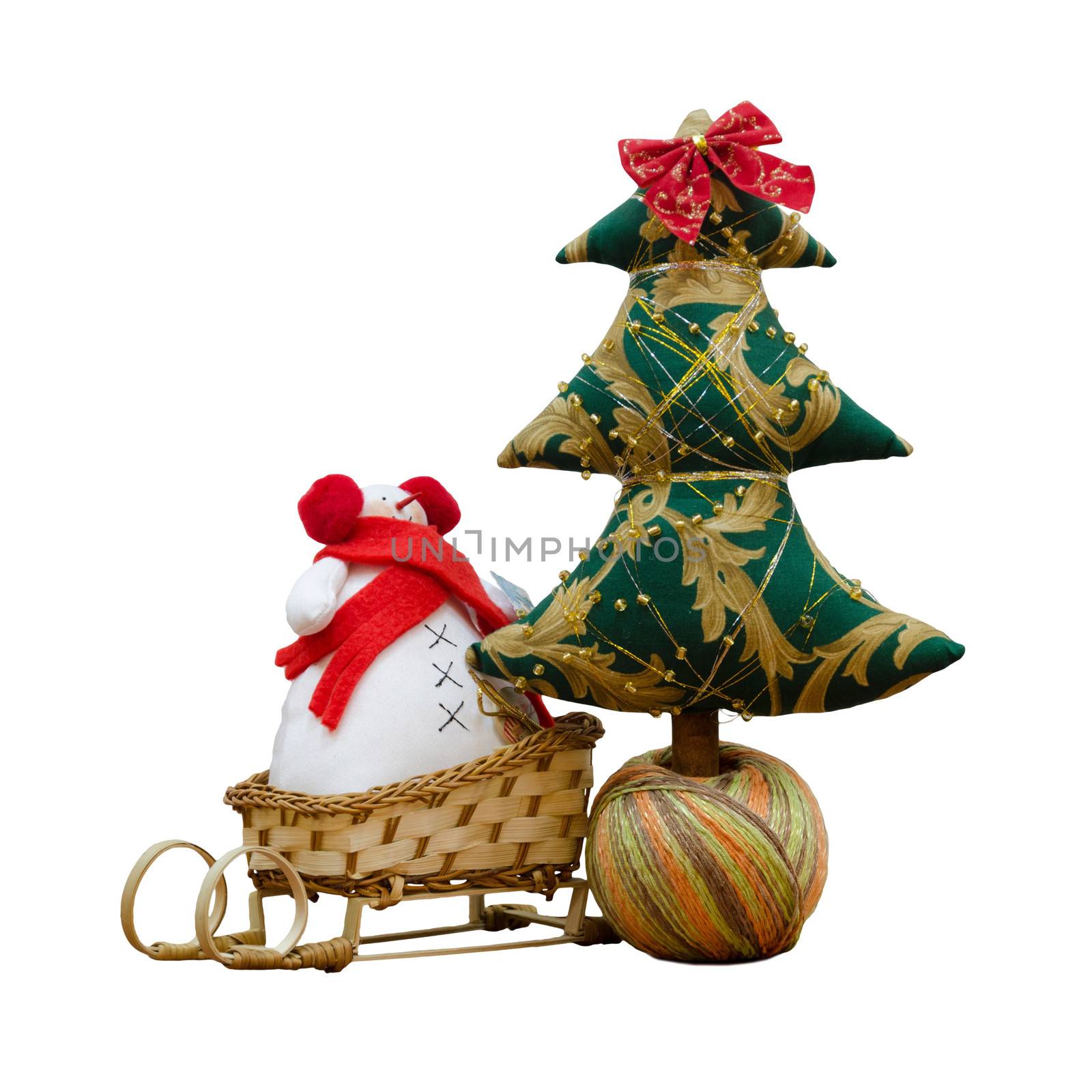 Handmade soft toy isolated New Year tree and a snowman on a sled by pt-home
