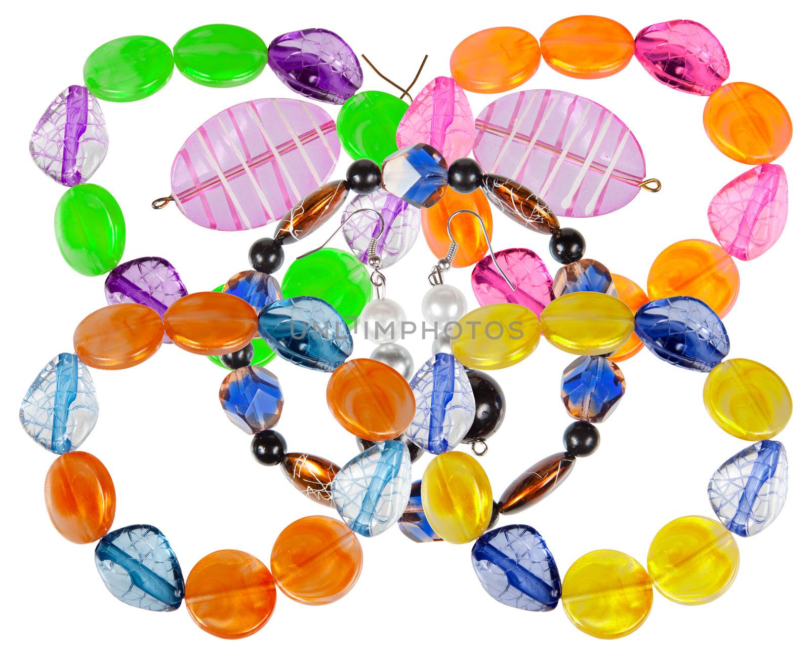 Bracelets and earrings made of handmade glass isolated on white background. collage