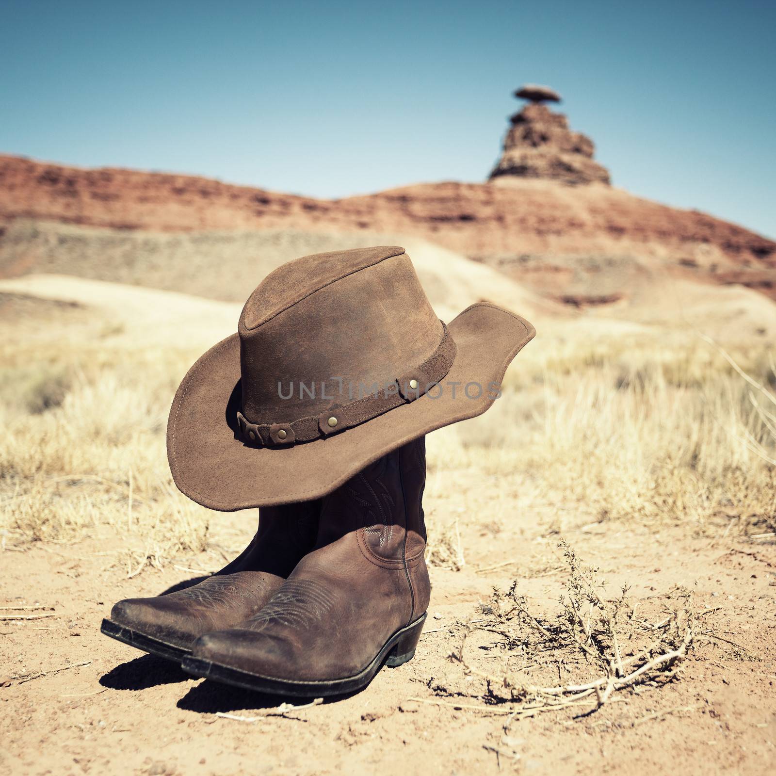 Boots and hat at Mexican Hat by vwalakte