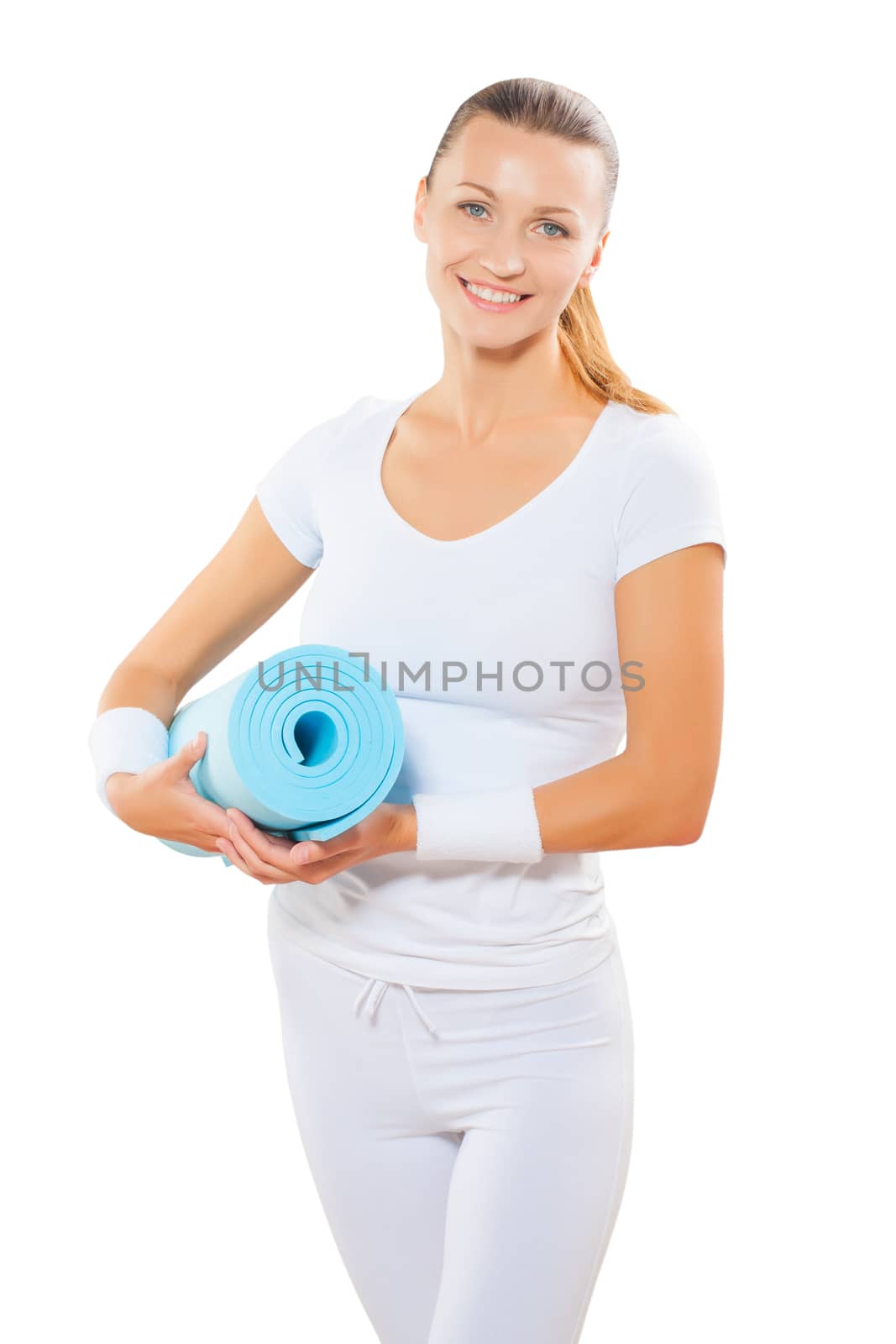 beautiful female wearing  sports clothes holdin blue yoga mat and smiling isolated on white background