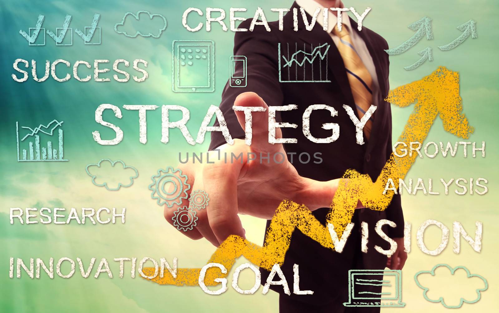 Businessman pointing STRATEGY with yellow arrow and business concept texts