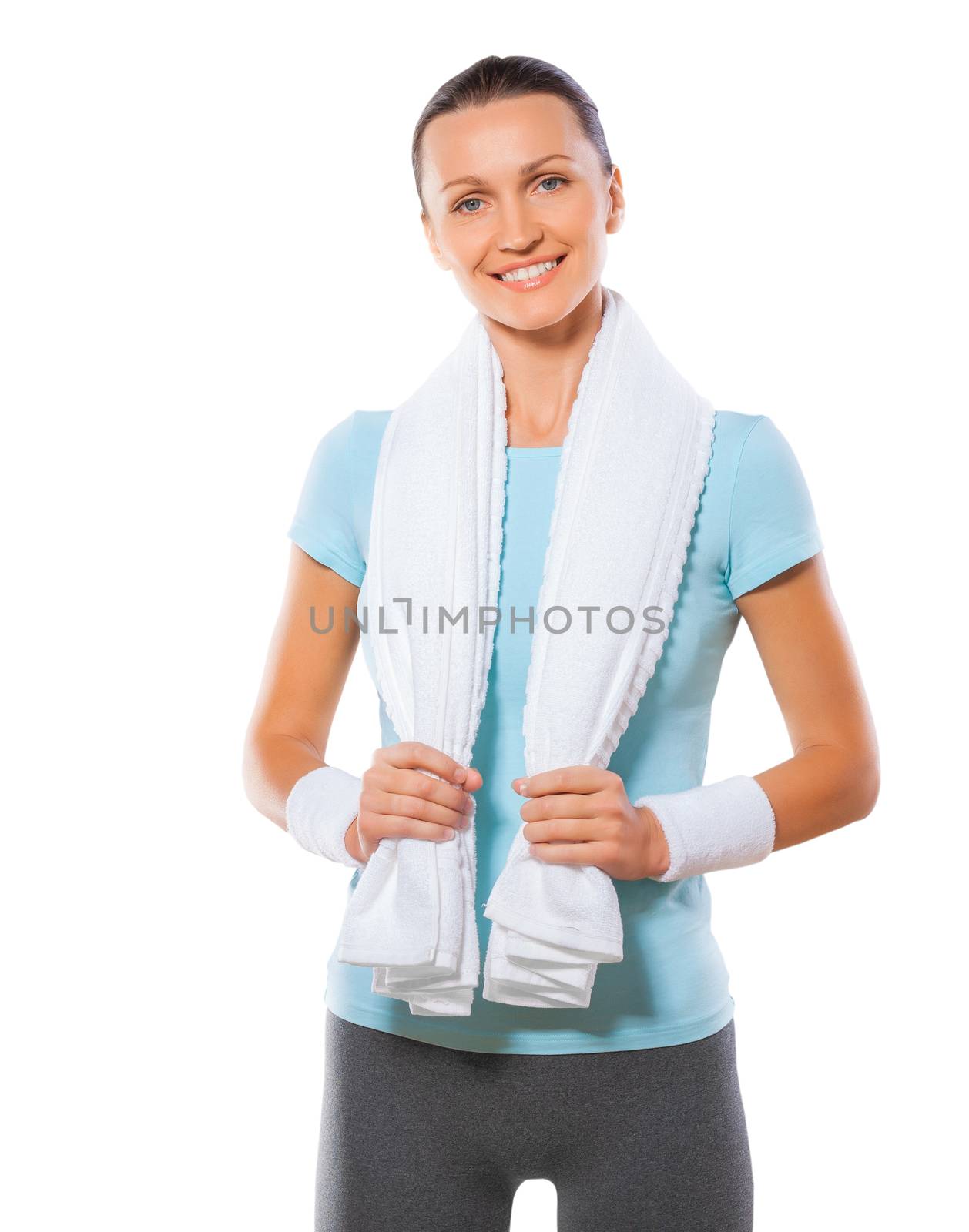 Fitness woman portrait isolated on white background. Smiling happy female fitness model looking at camera.