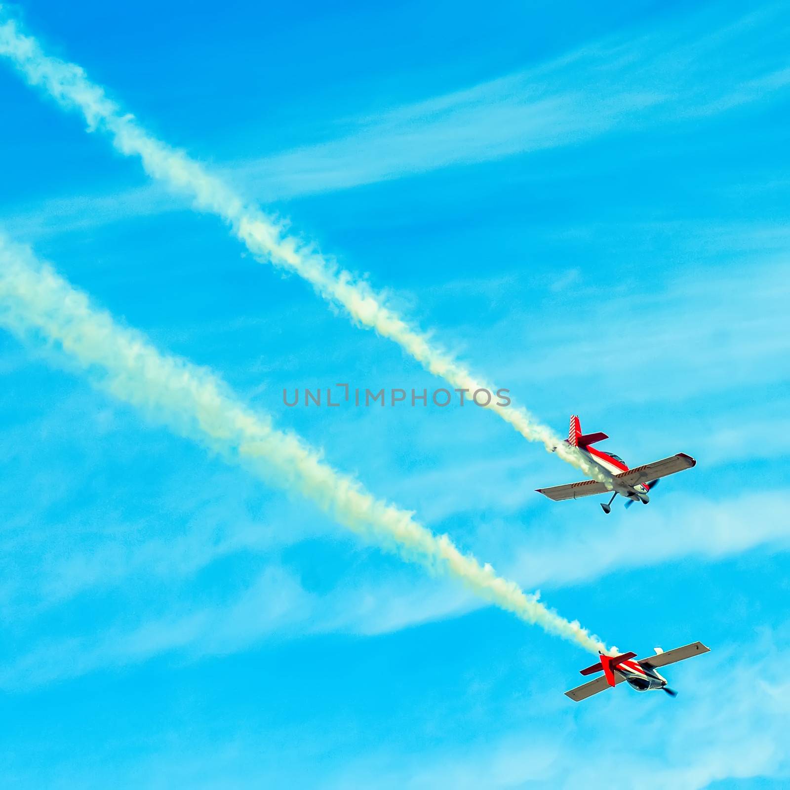 action in the sky during an airshow by digidreamgrafix