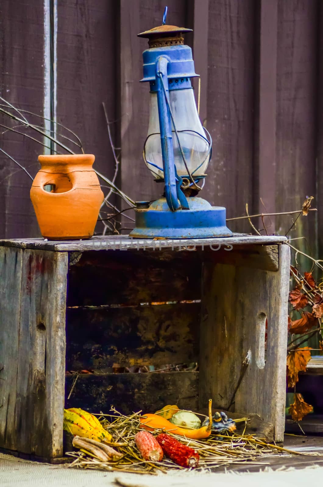 rustic old oil lantern on a farm