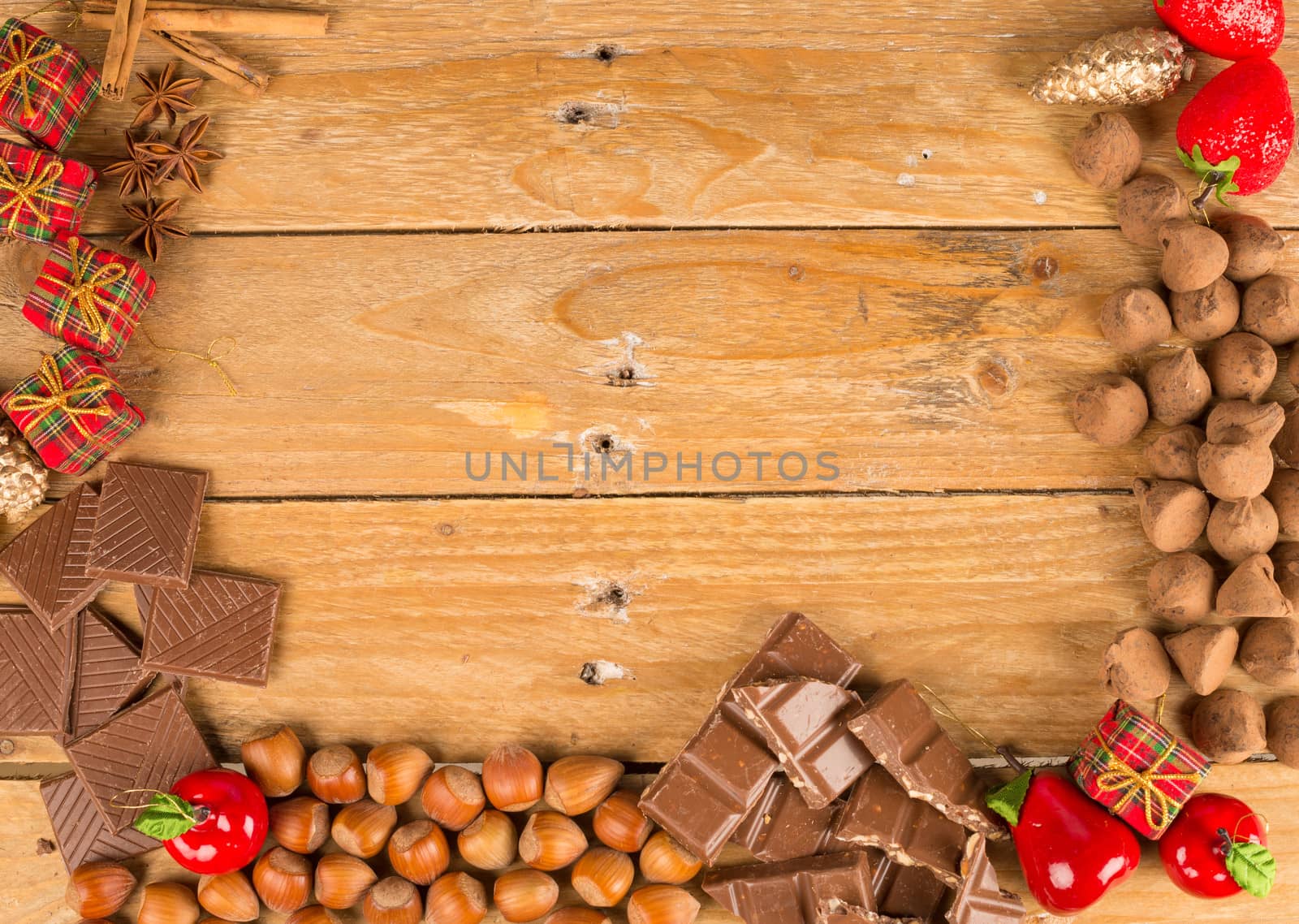 Christmas treats and food ingredients displayed on a rustic wooden table