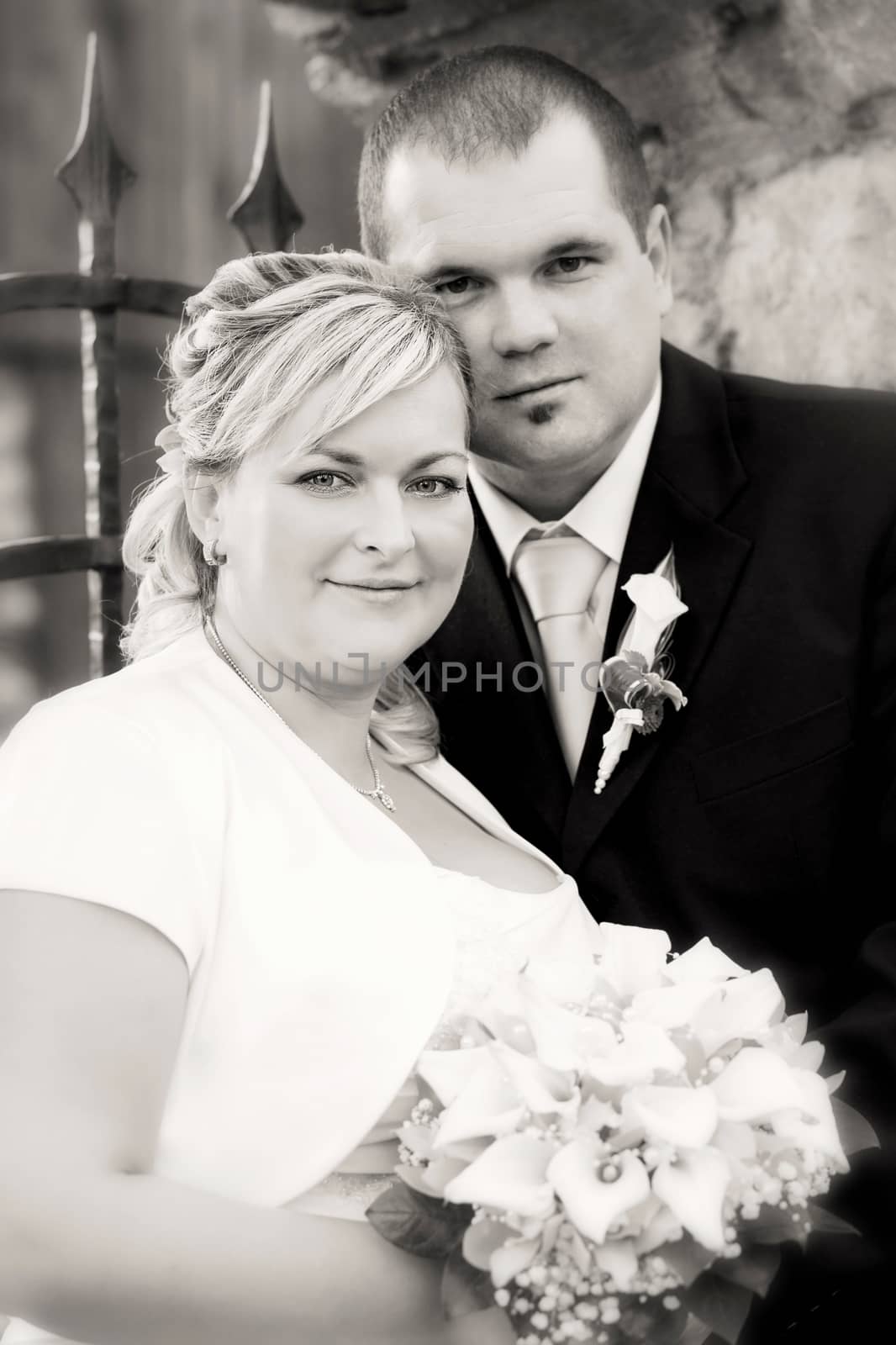 beautiful young wedding couple, bride and her groom, black and white tone