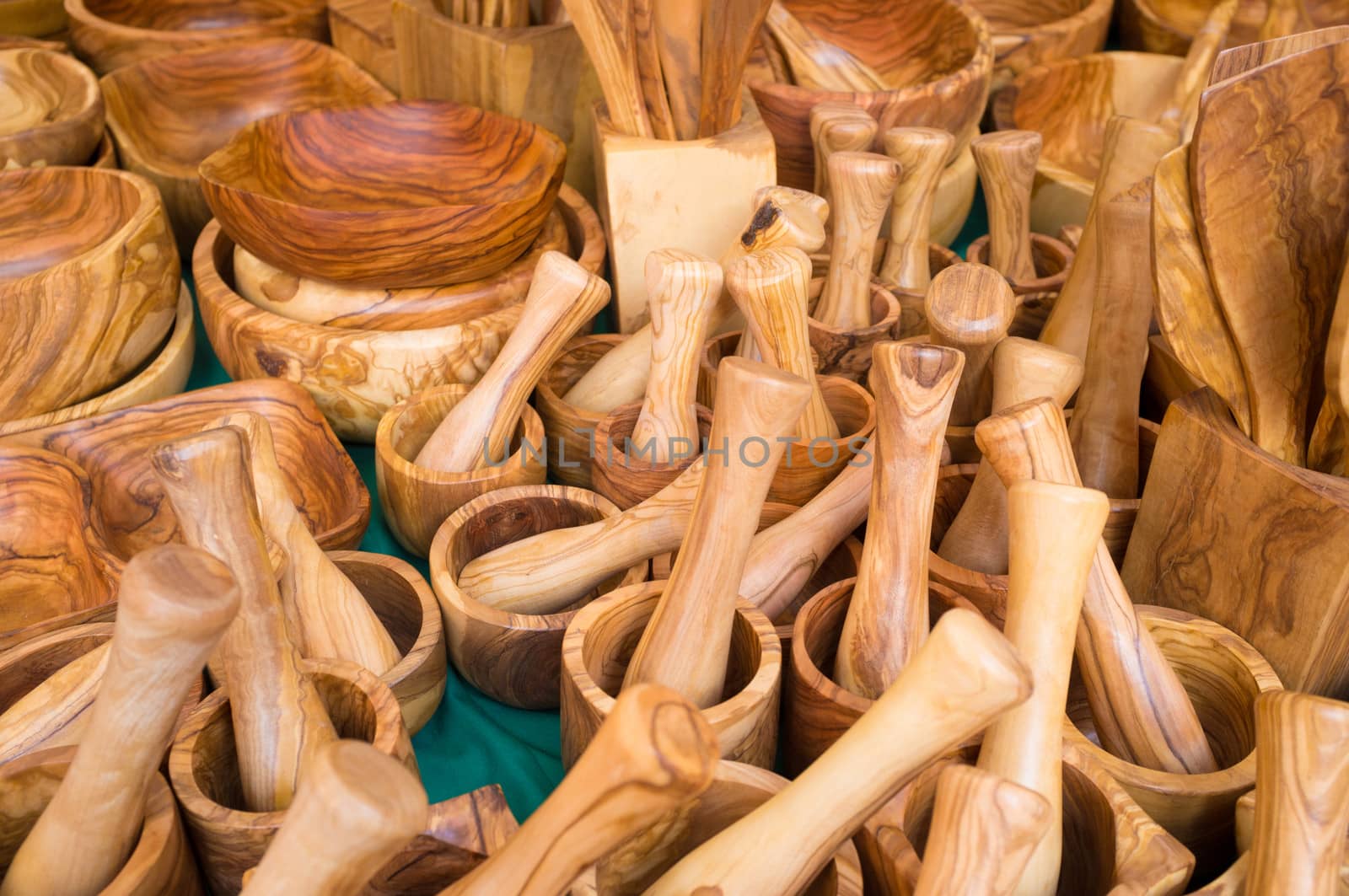 Full frame take of assorted kitchen utensils on a marke t stall