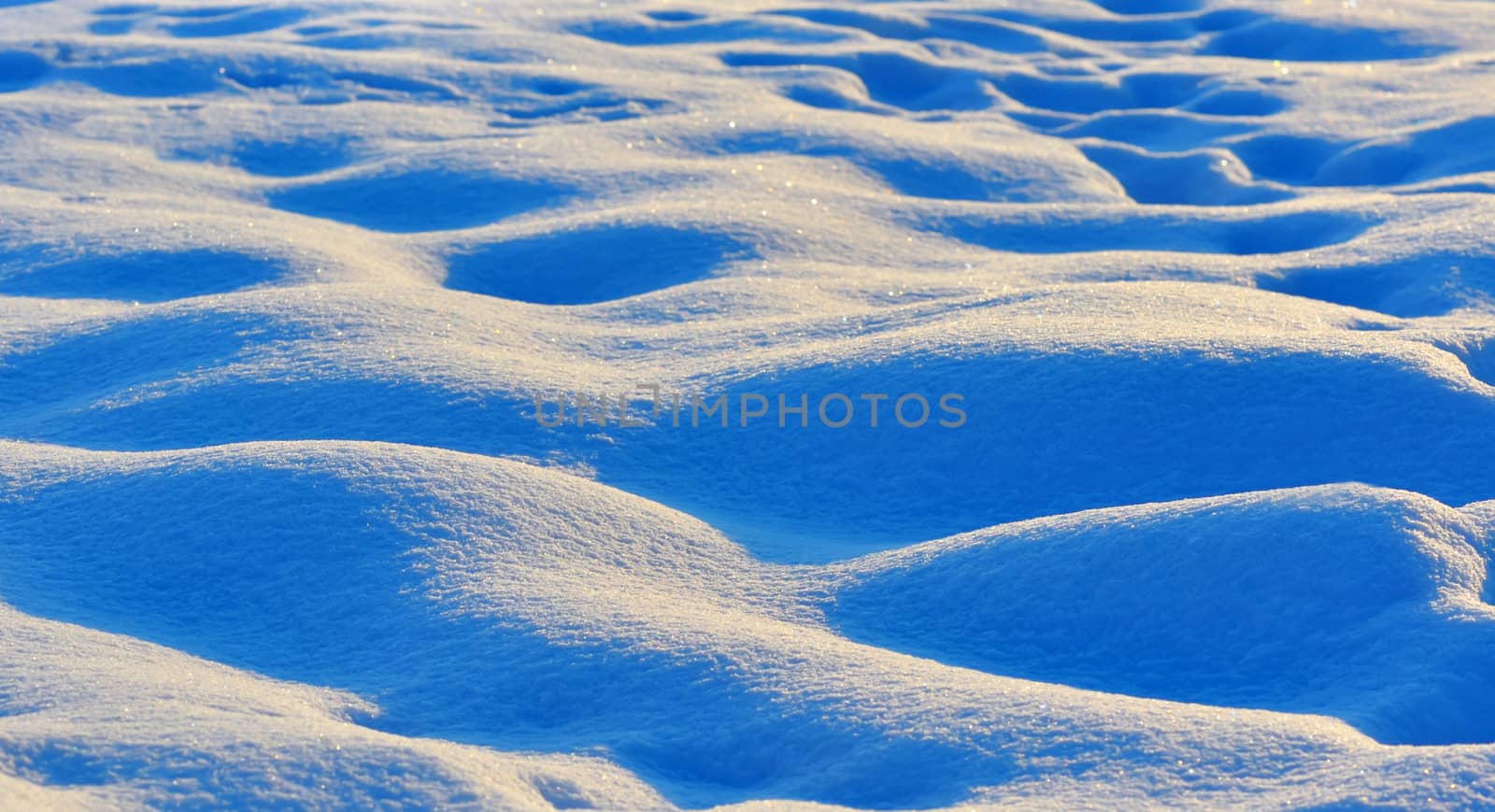 macro waves of snow bumps, shoot at sunrise