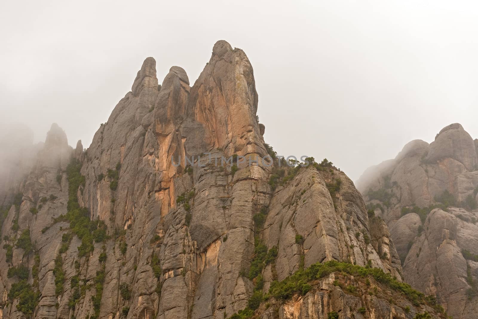  Landscape view at Montserrat. It is a multi-peaked mountain located near the city of Barcelona, in Catalonia, Spain. It is part of the Catalan Pre-Coastal Range.