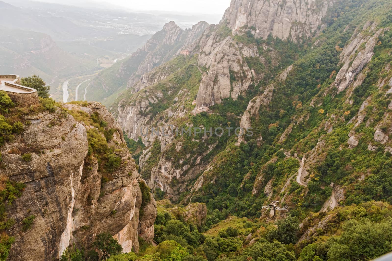  Landscape view at Montserrat. It is a multi-peaked mountain located near the city of Barcelona, in Catalonia, Spain. It is part of the Catalan Pre-Coastal Range.
