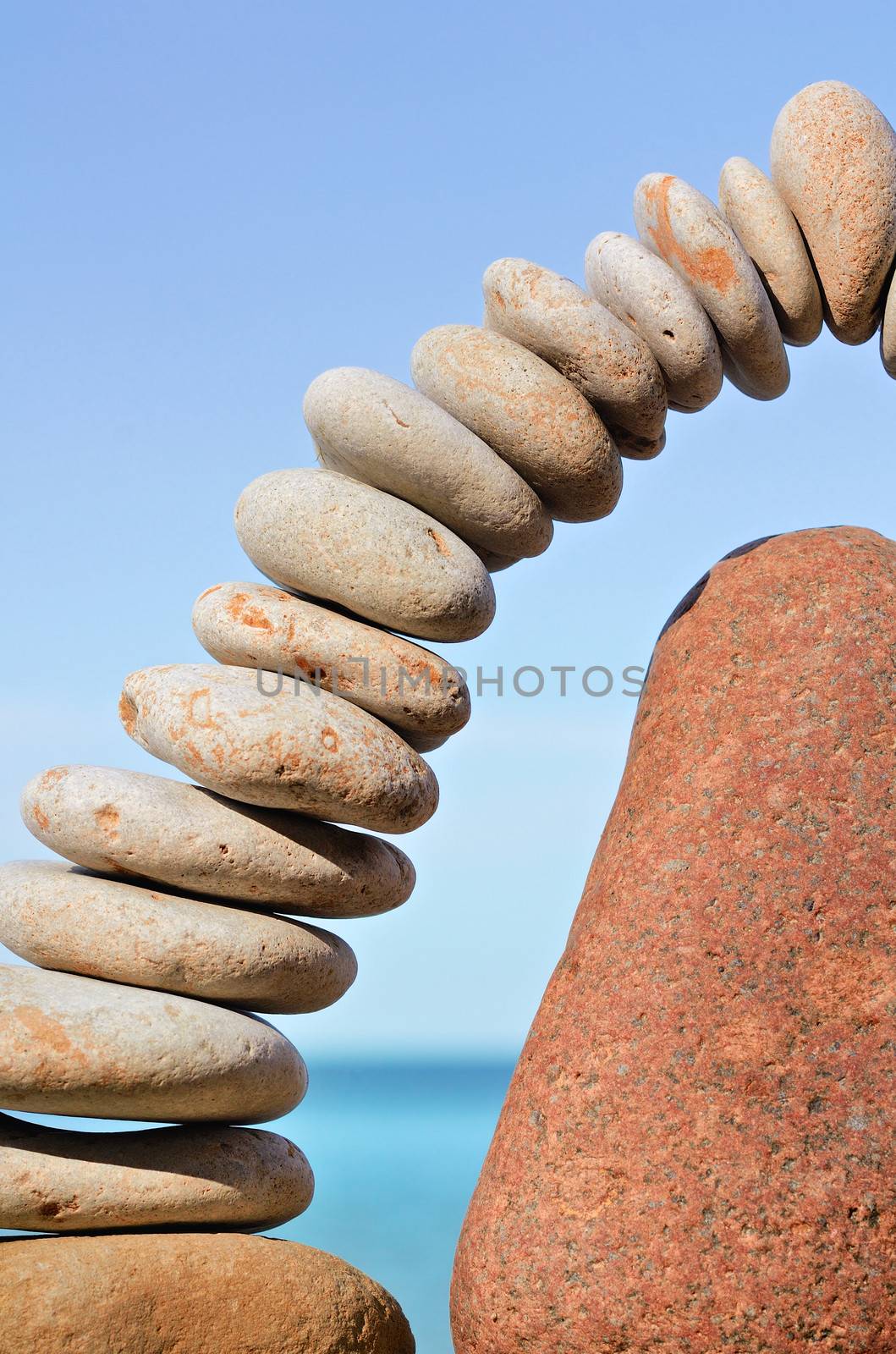 Connected group of small pebbles and boulder