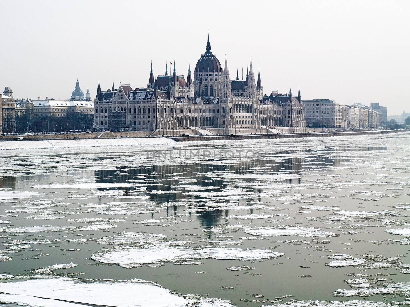 Parliament of Hungary and the icey river of Danube by anderm