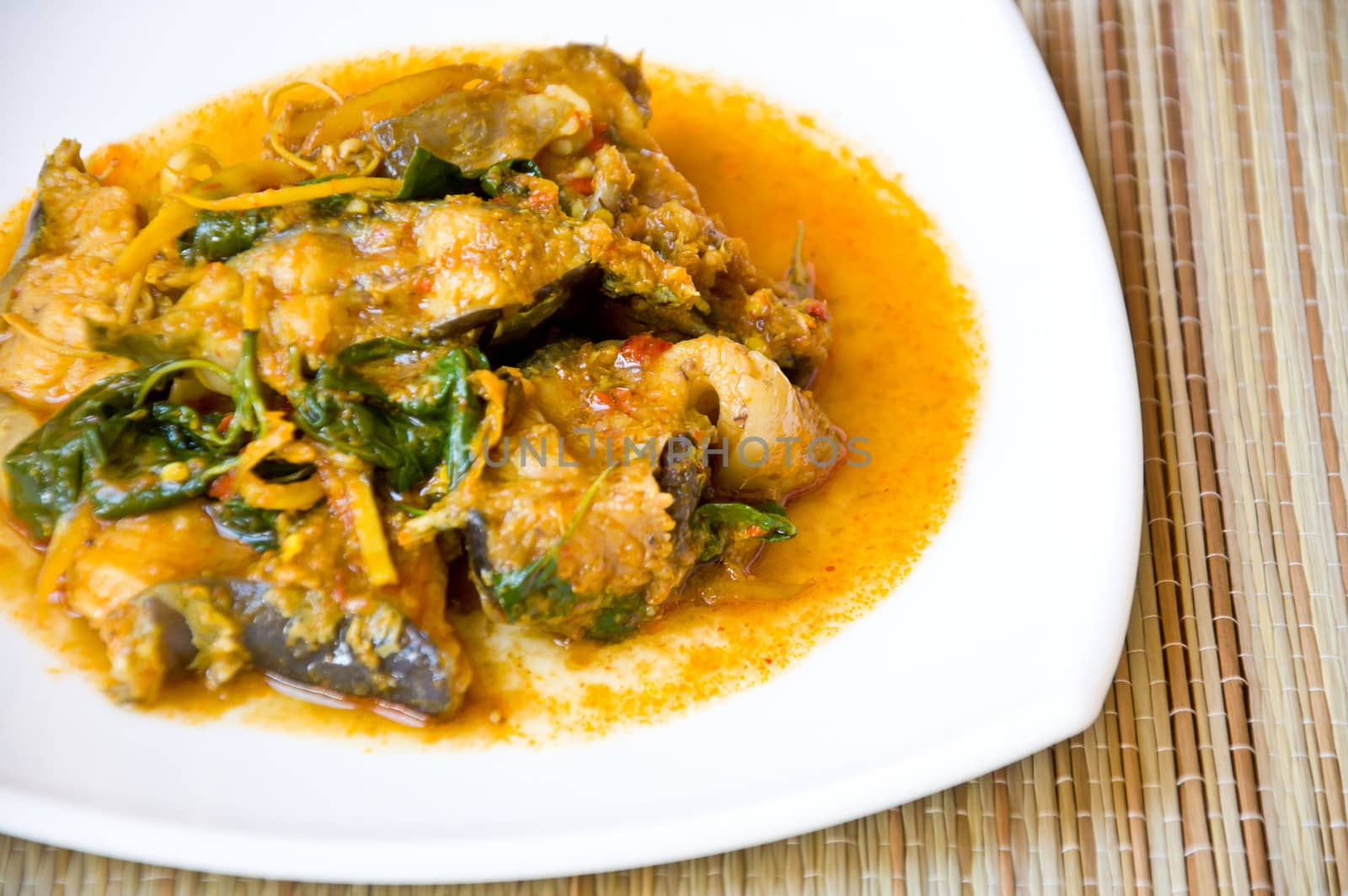 delicious Thai food call KAENG PLA DOOK from spicy curry and catfish