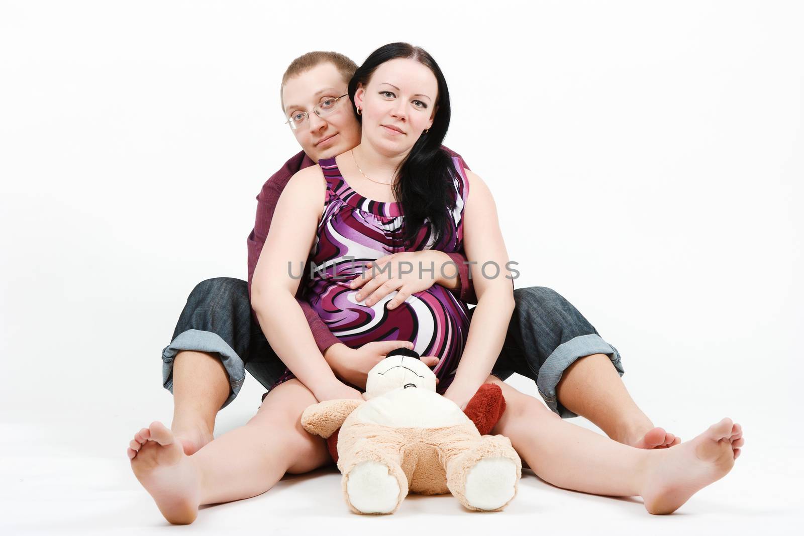 Young happy couple. Husband and pregnant wife by pzRomashka
