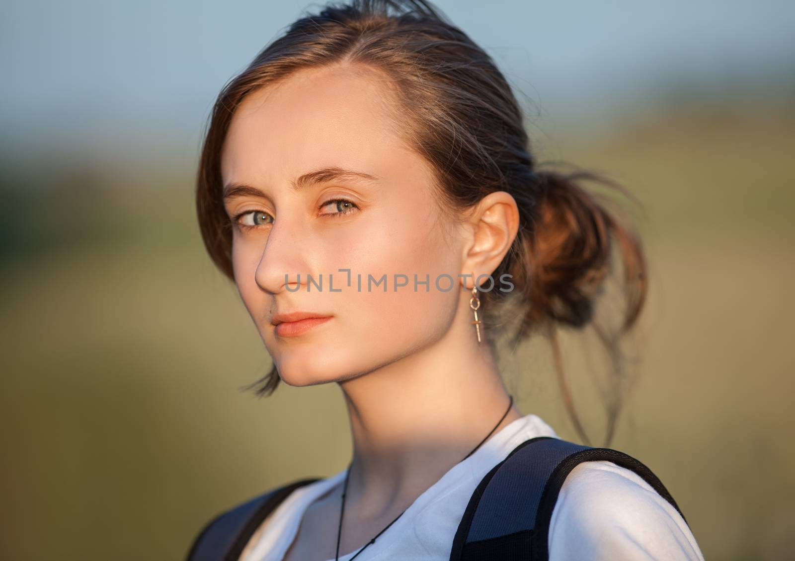 Pure, Natural, Beautiful Young Woman on Soft Nature Background