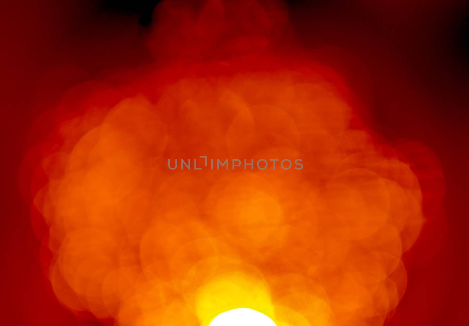 Natural bokeh on dark red background