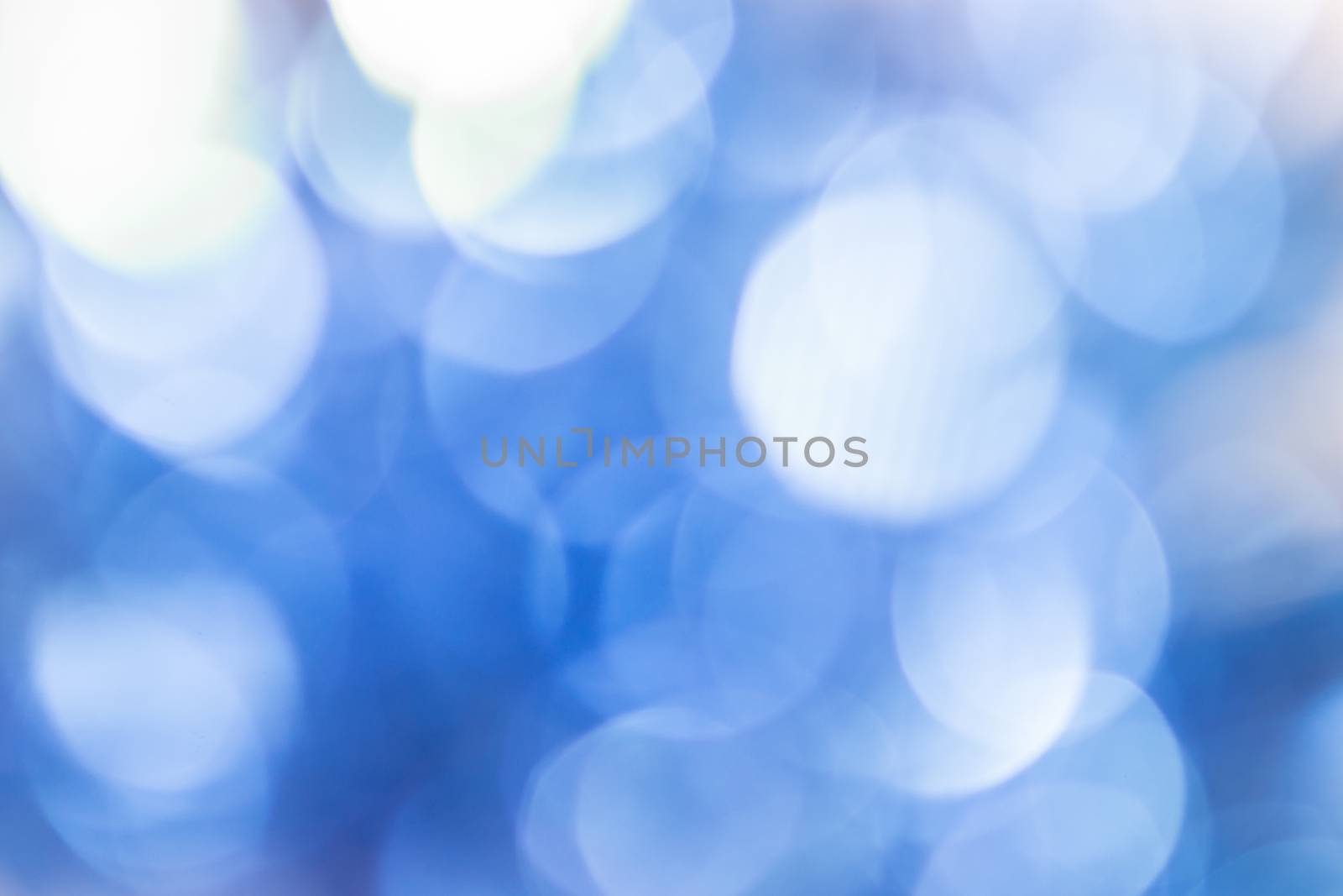 Natural smooth bokeh on blue background