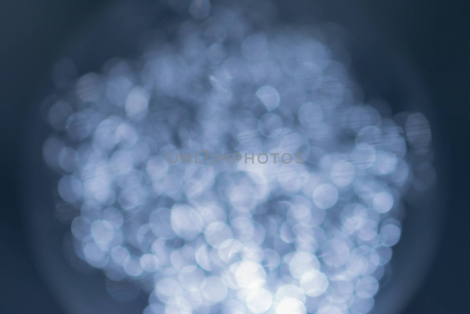 Natural smooth white bokeh on blue background